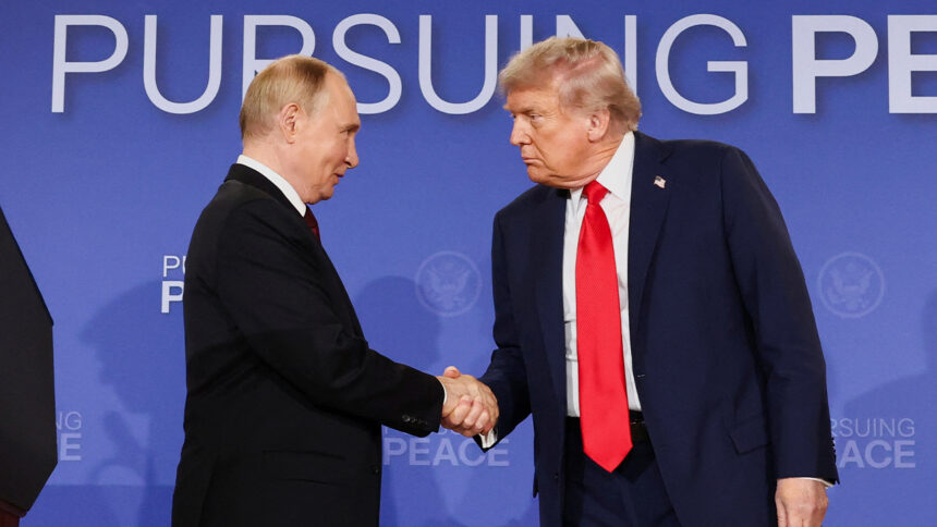 Trump putin shake
